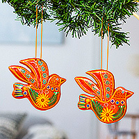 Ceramic ornaments, 'Orange Doves' (pair) - Colorful Flowers on Orange Ceramic Dove Ornaments (Pair)