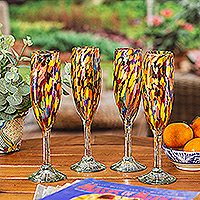 Handblown champagne flutes, 'Carnival' (set of 4) - Set of 4 Multicolor Handblown Champagne Flutes from Mexico