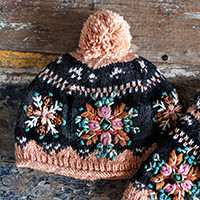 Hand knit wool hat, 'Sundari' - Women's All Wool Knit Hat Flower Embroidery Nepal