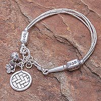 Silver charm bracelet, 'Floral Weave' - Thai Karen Hill Tribe Silver Beaded Floral Charm Bracelet