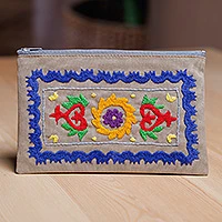 Hand-embroidered suzani cotton cosmetic bag, 'Chic Flair' - Cotton Cosmetic Bag with Suzani Hand-Embroidered Motifs