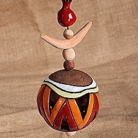 Ceramic wall decor, 'Fire Daghdghan' - Traditional Painted Warm-Toned Ceramic Daghdghan Wall Accent