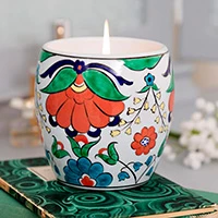 Ceramic candleholder with candle, 'Storied Glow Peony' - Hand-Painted Ceramic Candleholder with Hand-Poured Candle