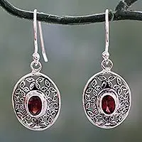 Garnet dangle earrings, 'Coy Crimson' - Flower Themed Garnet Dangle Earrings in Sterling Silver