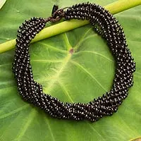 Wood torsade necklace, 'Chiang Rai Belle' - Dark Brown Torsade Necklace Wood Beaded Jewelry