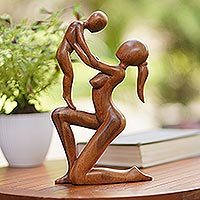 Wood sculpture, 'Take You Higher' - Mother and Child Suar Wood Sculpture