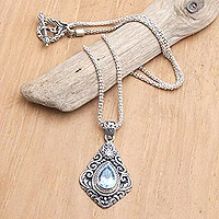 Blue topaz pendant necklace, 'Batur Style' - Sterling Silver Pendant Necklace with Blue Topaz Gemstone