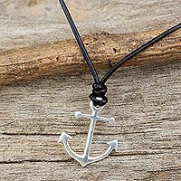 Sterling silver and leather pendant necklace,