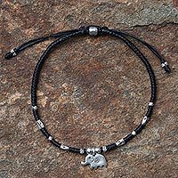 Silver accented cord bracelet,