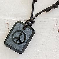 Jade pendant necklace, 'Peace and Love' - Jade Peace and Love Pendant on Black Cotton Necklace