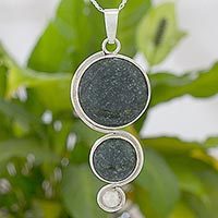Jade and sterling silver pendant necklace,