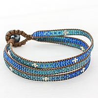 Glass beaded wristband bracelet, 'Blue Coast' - Glass Beaded Wristband Bracelet in Blue from Guatemala
