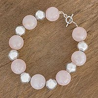 Rose quartz and sterling silver beaded bracelet,