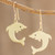 Brass dangle earrings, 'Gleeful Dolphins' - Handcrafted Brass Dolphin Dangle Earrings from Guatemala thumbail