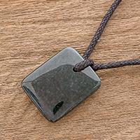 Jade pendant necklace, 'Dazzling Glory' - Green Jade Pendant Necklace with Black Cotton Cord