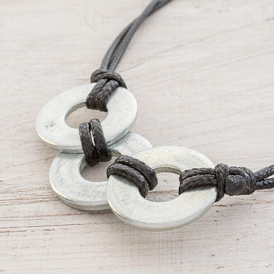 Upcycled metal pendant necklace, Strength and Loyalty