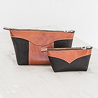 Leather cosmetic bags, 'Complementary in Russet' (pair) - Leather Cosmetic Bags in Black and Russet (Pair)