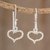 Sterling silver dangle earrings, 'Real Hearts' - Heart-Shaped Sterling Silver Dangle Earrings from Guatemala thumbail