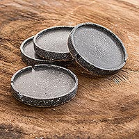 Cement coasters, 'Speckled Black' (set of 4) - Molded Cement Round Coasters in Speckled Black (Set of 4)