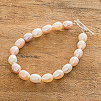 Cultured pearl strand bracelet, 'Rosy Future' - Artisan Crafted Cultured Pearl Bracelet