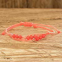 Beaded macrame bracelet, 'Evening Glow' - Orange Beaded Macrame Bracelet from Guatemala