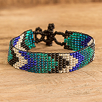 Glass beaded wristband bracelet, 'Water Directions' - Handcrafted Geometric Blue Glass Beaded Wristband Bracelet