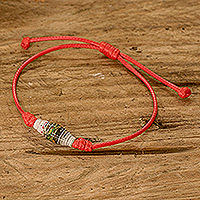 Recycled paper pendant bracelet, 'Earth's Riches in Red' - Red Recycled Paper Pendant Bracelet with Adjustable Cord