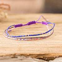 Beaded strand bracelet, 'Magical Lives' - Handcrafted Purple Glass Beaded Three-Strand Bracelet