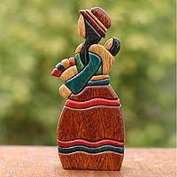 Cedar and mahogany sculpture,