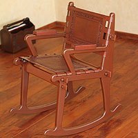 Mohena wood and leather rocking chair,