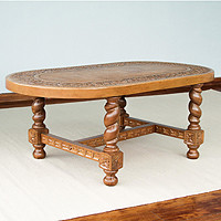 Mohena wood and tooled leather table,