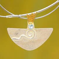 Gold accent aquamarine pendant necklace,