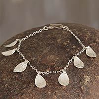 Sterling silver charm bracelet,