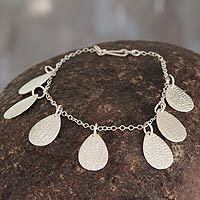 Sterling silver charm bracelet,