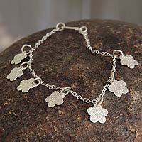 Sterling silver charm bracelet,