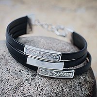 Sterling silver and leather wristband bracelet,