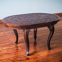 Mohena wood and leather coffee table,