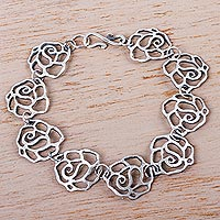 Sterling silver link bracelet, 'Dry Rose' - Hand Crafted Sterling Silver Link Bracelet with Floral Motif