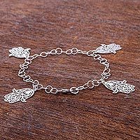 Sterling silver charm bracelet,