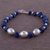 Sodalite beaded bracelet, 'Blue Pebbles' - Sodalite and Sterling Silver Beaded Bracelet from Bali thumbail