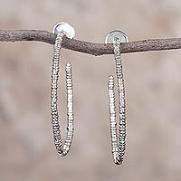 Sterling silver half-hoop earrings,