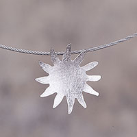 Sterling silver pendant necklace, 'Sun Splash' - Sun-Shaped Sterling Silver Pendant Necklace from Peru