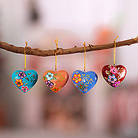 Ceramic ornaments, 'Love Quartet' (set of 4) - Hand Painted Ceramic Heart-Shaped Ornaments (Set of 4)