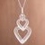 Sterling silver filigree pendant necklace, 'Cascading Love' - Sterling Silver Filigree Triple Heart Pendant Necklace thumbail