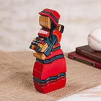 Wood sculpture, 'Selling Flowers' - Handcrafted Wood Sculpture of a Flower Seller from Peru