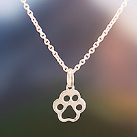 Sterling silver pendant necklace, 'Puppy Paw' - Sterling Silver Dog Paw Print Pendant Necklace from Peru