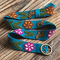 Embroidered belt, 'Llama Cavalcade' - Turquoise Cloth Belt Embroidered with Llamas and Flowers