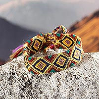 Macrame wristband bracelet, 'Magic Mountains' - Peruvian Handwoven Wristband Bracelet with Colorful Pattern