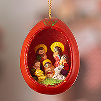 Ceramic ornament, 'Crimson Nativity Egg' - Red Ceramic Nativity Christmas Ornament Hand-Painted in Peru