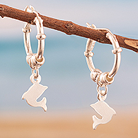 Sterling silver hoop earrings, 'Happy Dolphin' - Sterling Silver Hoop Earrings with Dangling Dolphin Charms